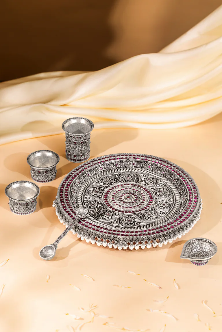 Silver serveware by Katiayini